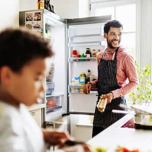 Father and son in kitchen